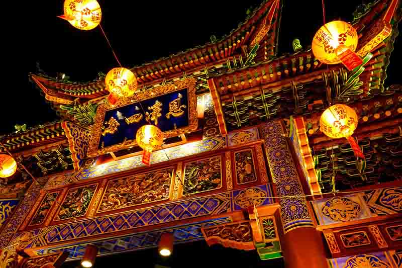 Bustling Chinatown in Singapore with traditional shops and vibrant streets